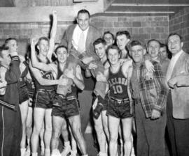Men's basketball team celebrates a win over Mankato State, St. Cloud State