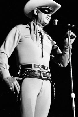 Clayton Moore, better know as the Lone Ranger, performs at the Salute to the Fabulous Fifties show at Halenbeck Hall (1965), St. Cloud State University