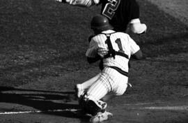Buddy Schneider tags out a runner during a St. Cloud State University baseball game against Southwest State University