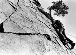 Patrick Loven rock climbs at Taylors Falls State Park, St. Cloud State University