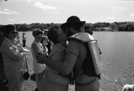 Dennis Caneff's mother greets Rolf Hagberg in St. Cloud during their trip down the Mississippi River, St. Cloud State University