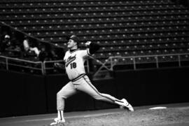 Baseball pitcher Pete Pratt throws a baseball, St. Cloud State University