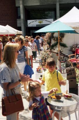 People visit vendors' booths, Lemonade Concert and Art Fair, St. Cloud State University
