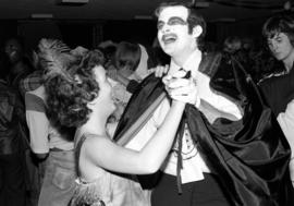 Man and woman dance together at the Halloween Hullabaloo, St. Cloud State University