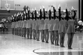 The danceline performs at halftime of a men's basketball game at Halenbeck Hall (1965), St. Cloud State University