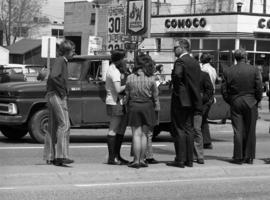 People stand in the middle of a road, Day of Peace protest, St. Cloud State University