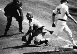 St. Cloud State University baseball catcher waits for the ball