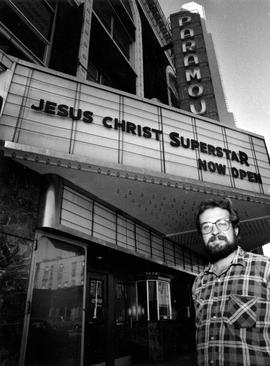 New Tradition Theatre Company director Brian Martinson stands under the Paramount Theatre's marquee