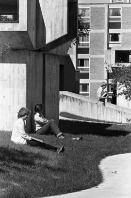 Students sit near the Performing Arts Center (1968), St. Cloud State University