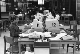 Student uses a computer, Centennial Hall (1971), St. Cloud State University