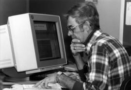 Student uses a computer, St. Cloud State University