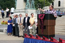 Minnesota Governor Arne Carlson addresses the crowd at the 125th anniversary celebration for St. Cloud State