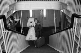 Nancy Brosious walks up the Carol Hall (1936) staircase, St. Cloud State University