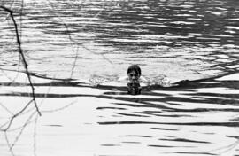 Curt Quiner swims across the Mississippi River, St. Cloud State University