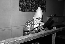 Conehead with a chainsaw at the haunted Halloween Carnegie library event, St. Cloud State University