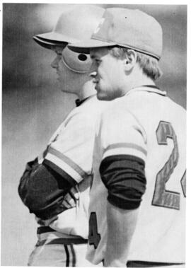 St. Cloud State University baseball players Rob Scheil and Jon Rambow chat over a play