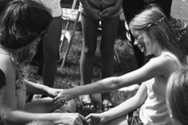 A girl shows off her painted face, Lemonade Fair, St. Cloud State University