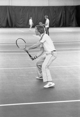 St. Cloud State tennis player Todd Holes plays in a match against University of Wisconsin-Stout