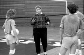 Volleyball coach Dianne Glowatzke talks to players during practice, St. Cloud State University