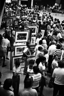 People gather near to visit vendors' booths, Lemonade Concert and Art Fair, St. Cloud State University