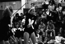 Sheri Mandell prepares to hit a volleyball during a volleyball match, St. Cloud State University