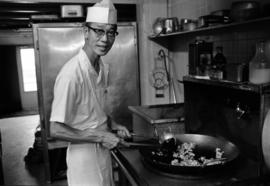 Jack Wong cooks at the O.K. Cafe