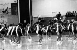 Cheerleaders perform at the St. Cloud State men's basketball game against Morningside College