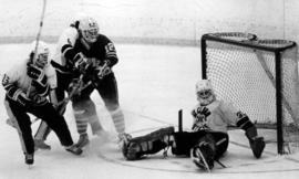 St. Cloud State University hockey goalie Bill Korfhage defends the net during a game against Mankato State University