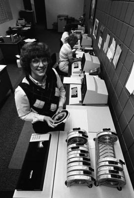 Cynthia Holm stands in a computer laboratory, St. Cloud State University