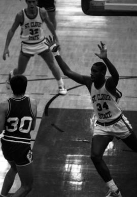 Tony King defends in a basketball game against Moorhead State University, St. Cloud State University