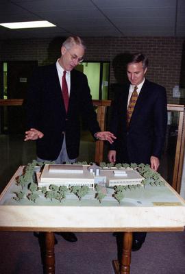 St. Cloud University President Bruce Grube, left, and Minn. Rep. Joe Opatz, SCSU special assistant to the president, examine a model of the proposed new library,