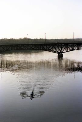 Rowing Club members row on the Mississippi River, St. Cloud State University