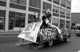 KVSC homecoming parade float in downtown St. Cloud, St. Cloud State University