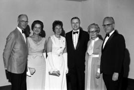 George Budd, Charles Graham, and Robert Wick and wives gather together, Charles Graham inauguration, St. Cloud State University