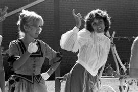 Two women stand together, Lemonade Concert and Art Fair, St. Cloud State University