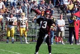 Keith Heckendorf plays quarterback during a football game against Augustana College, St. Cloud State University