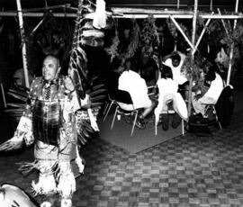 People participate at a pow wow, St. Cloud State University