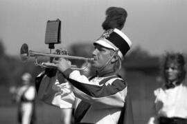 Marching band performs at a football game, St. Cloud State University