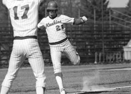 Jeff Schlink scores a run during a St. Cloud State University baseball game against Augsburg College