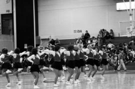 Cheerleaders perform at the St. Cloud State men's basketball game against Morningside College