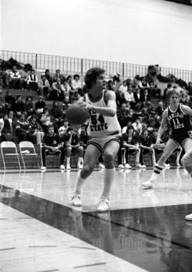 St. Cloud State University basketball player Dan Hagen holds the basketball during a game against Bemidji State University