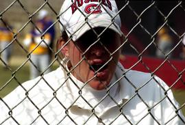 Paula U'Ren coaches during a softball game against Minnesota State University Mankato, St. Cloud State University