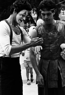 A mime interacts with another performer, Lemonade Concert and Art Fair, St. Cloud State University