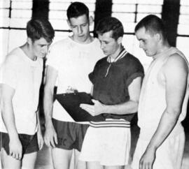 St. Cloud State men's basketball coach Ken Novak at practice with three players