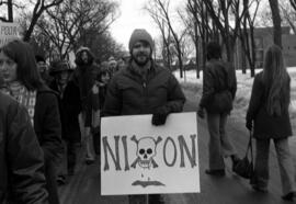 A Vietnam protester holds a sign during a protest