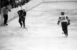 St. Cloud State hockey player Dan Pratt skates with the puck against the University of Alaska-Fairbanks