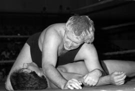 Wrestler Bobby "The Brain" Heenan pins Steve Olsonoski during a match at Halenbeck Hall (1965), St. Cloud State University