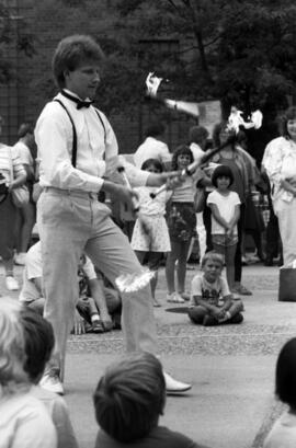 A man juggles items on fire, Lemonade Concert and Art Fair, St. Cloud State University