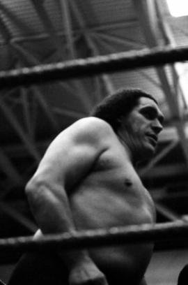 Wrestler Andre The Giant stands in the wrestling ring during a match at Halenbeck Hall, St. Cloud State University