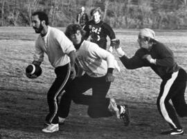 Men playing intramural football, St. Cloud State University